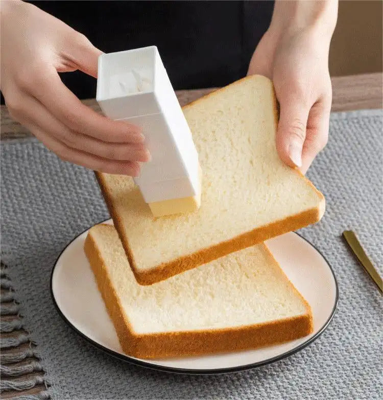 Hand Holding Rotary Roll Out Butter Spreader Kitchen Gadgets Baking Butter Spreader